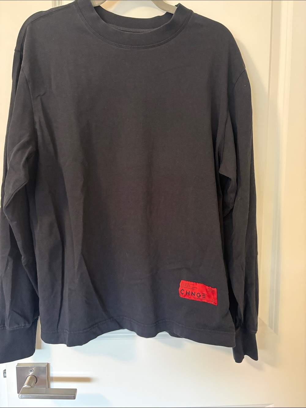 CHNGE Black Tee with Red and White Logo Patch